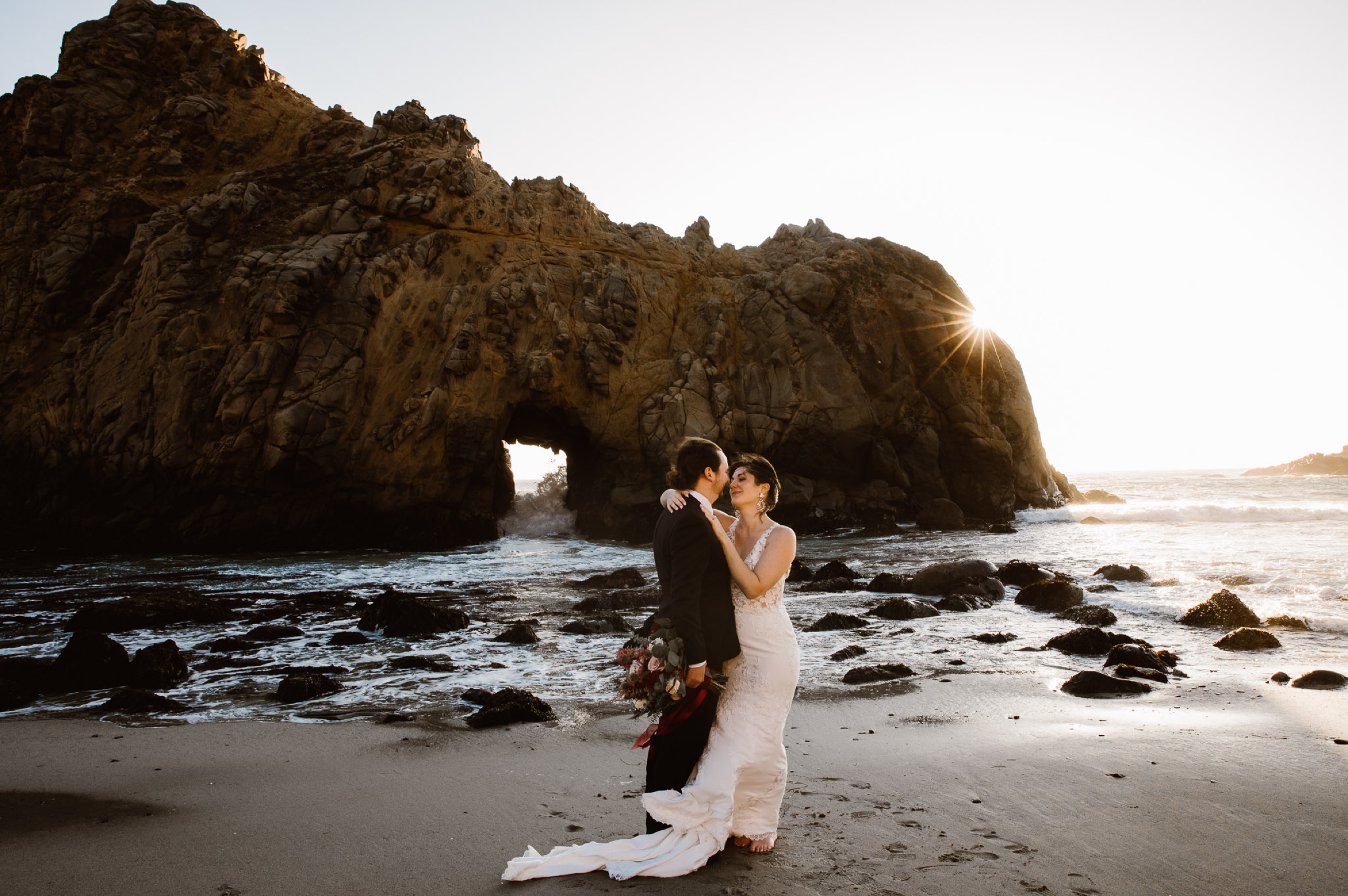 Big Sur — sunset under a sea arch.